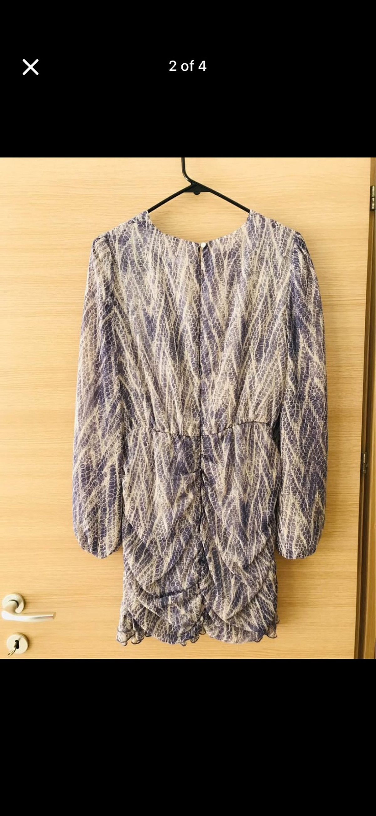Vestido mini estampado con fruncidos de Zara - photo 2