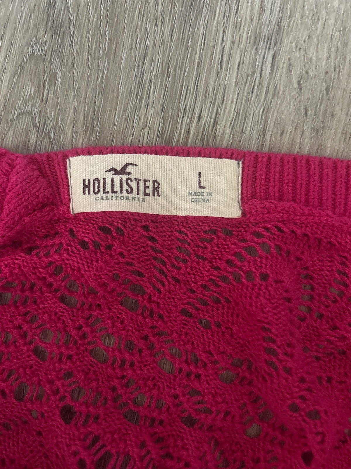 Sweater maħdum bil-labar roża jgħajjat ta' Hollister - photo 2