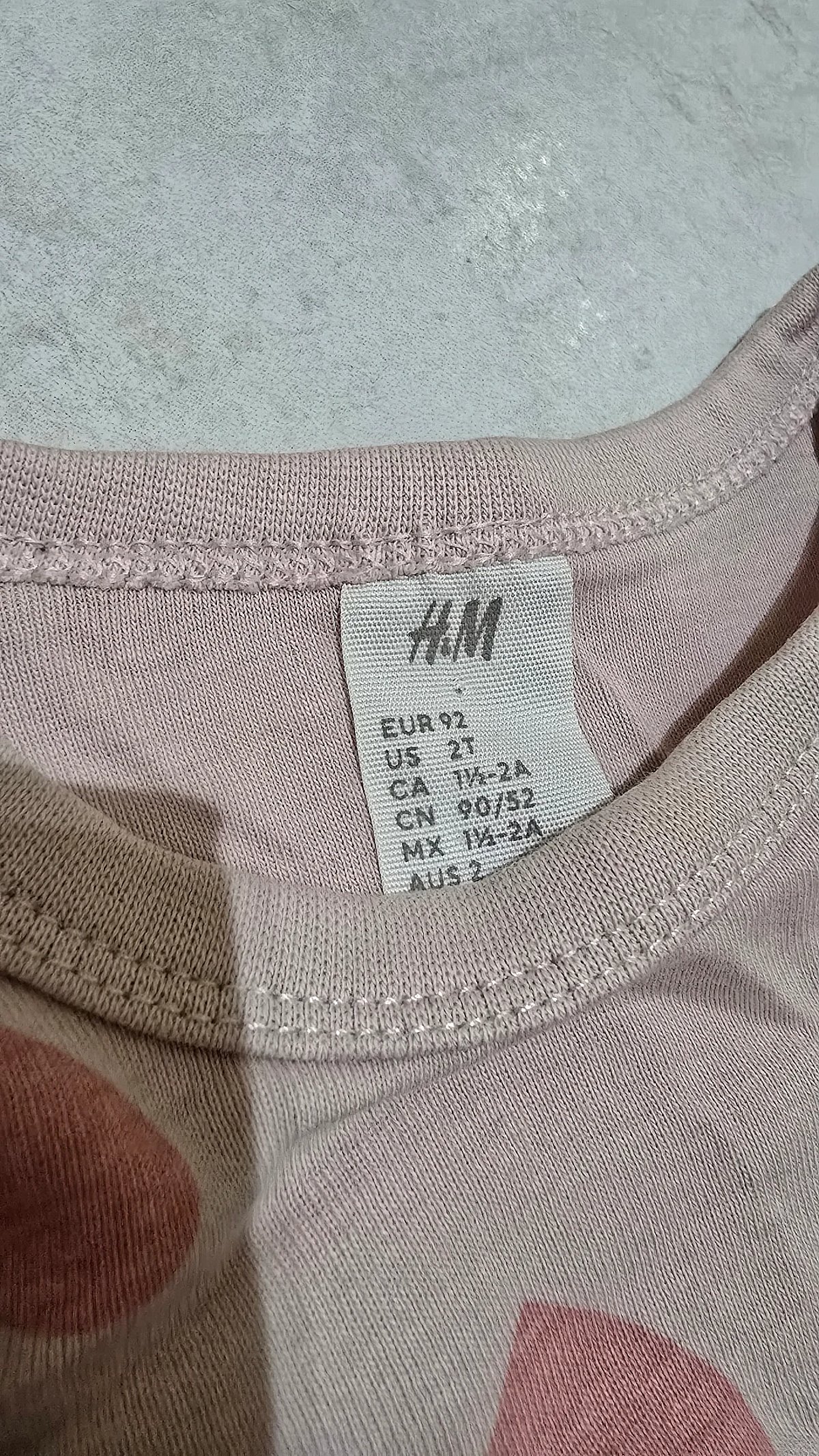 Bodysuit tat-trabi bi stampar ta' qalb roża ta' H&M - photo 3