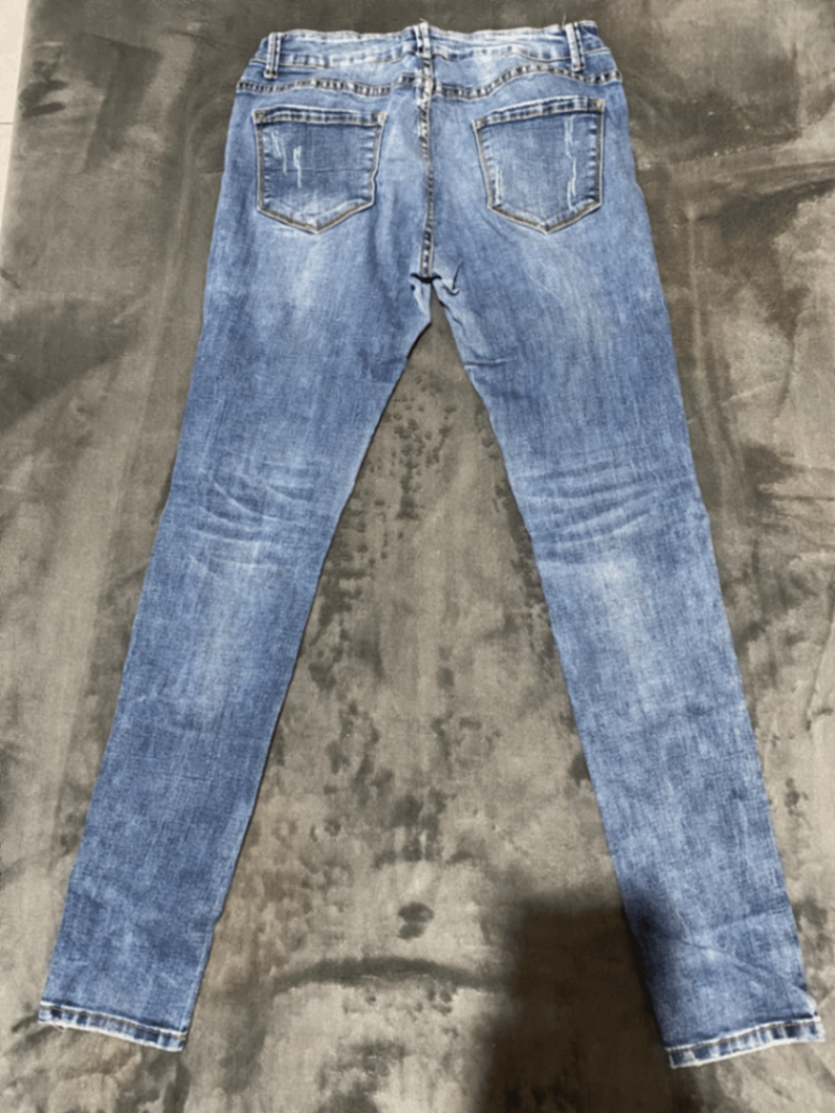 Jeans blu skinny tad-denim imħassra - photo 2