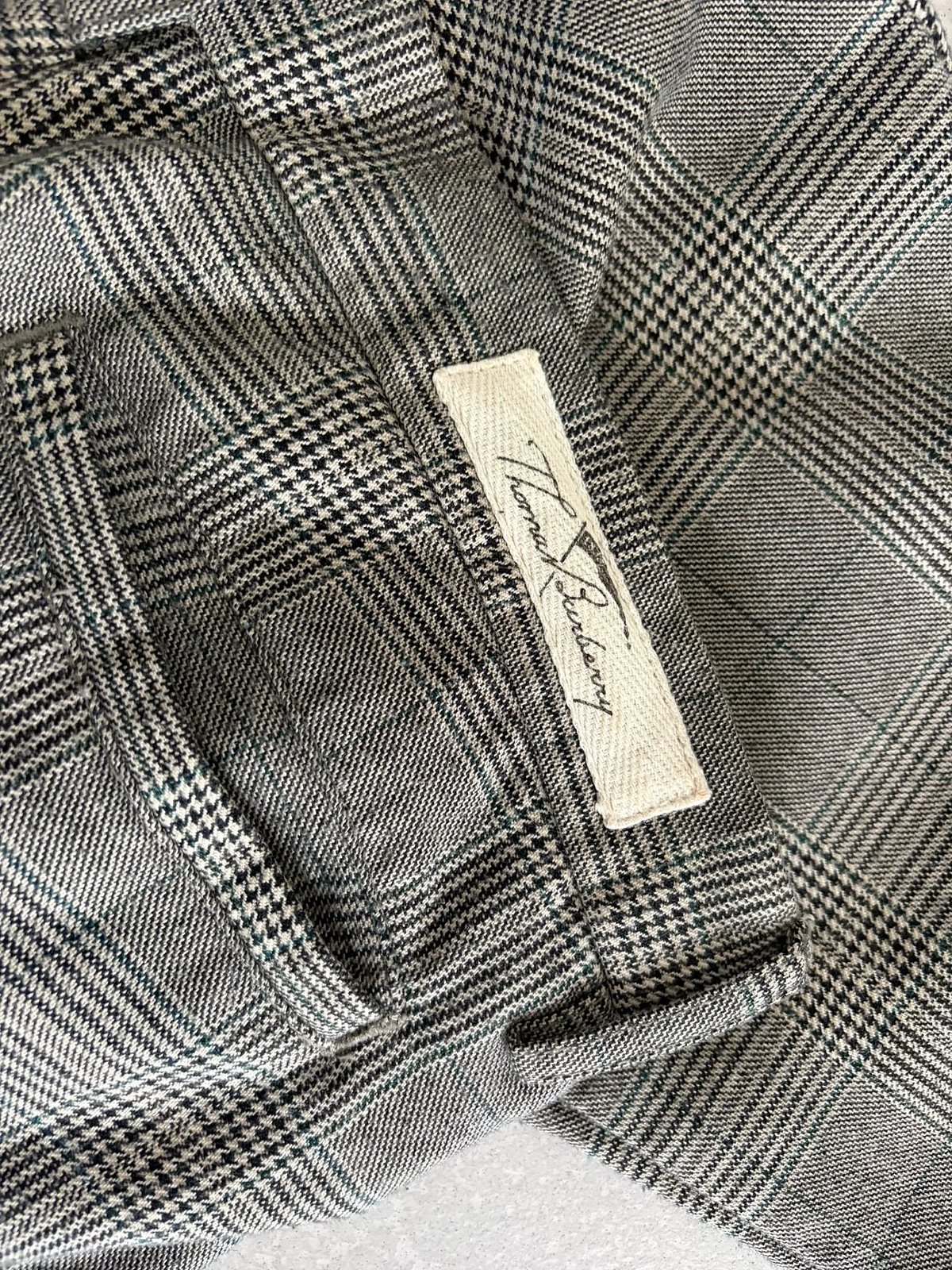 Qalziet bil-Kontrolli ta' Thomas Burberry - photo 6