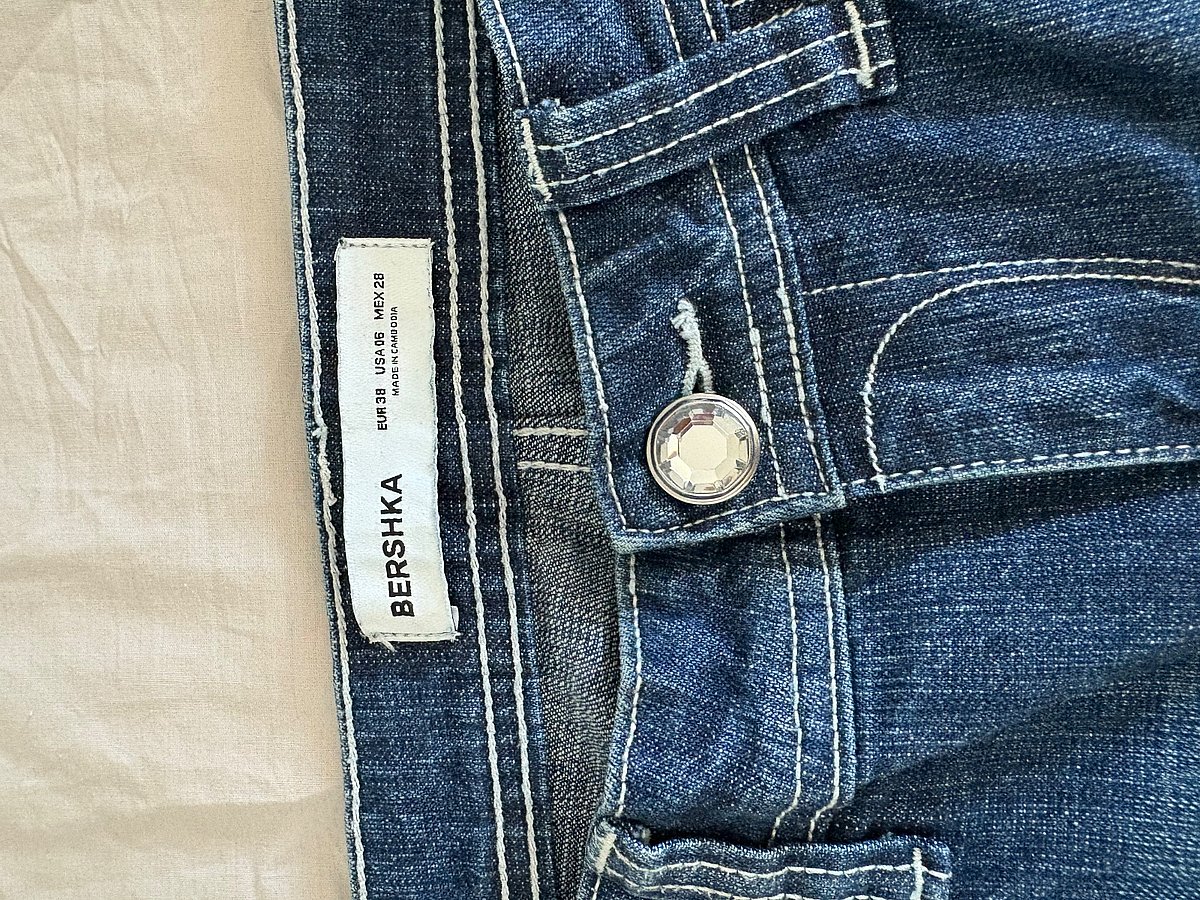Jeans in denim blu a zampa - photo 3