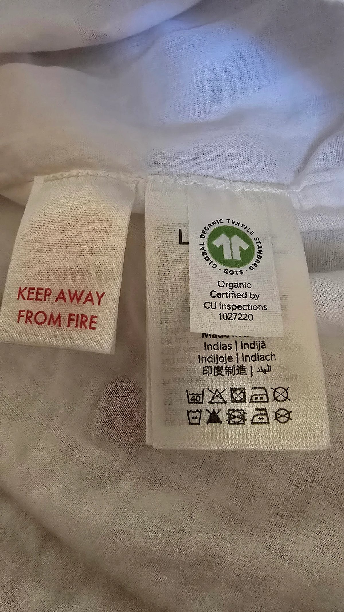 Vestido branco bordado em algodão orgânico da Lindex  - photo 5