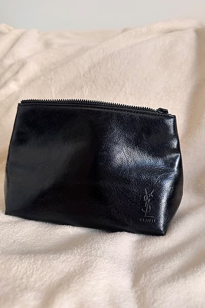 Astuccio nero Yves Saint Laurent by Yves Saint Laurent — pre-loved on Thrifted.mt