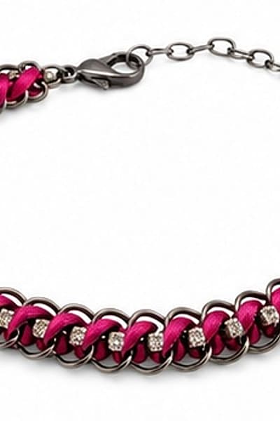 Bracciale in metallo rosa e scuro — pre-loved on Thrifted.mt