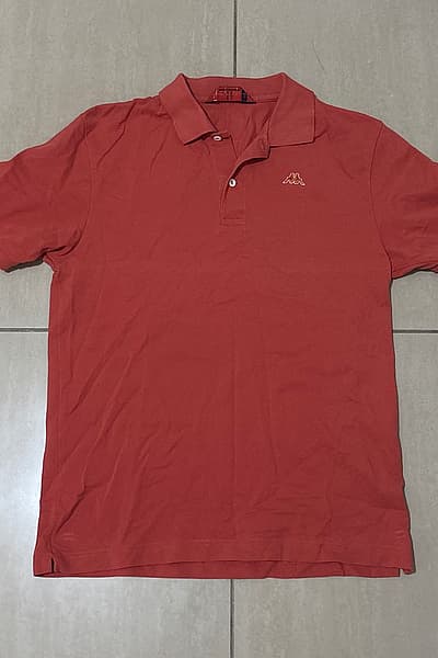 Qmis Polo Oranġjo Kappa by Kappa — pre-loved on Thrifted.mt