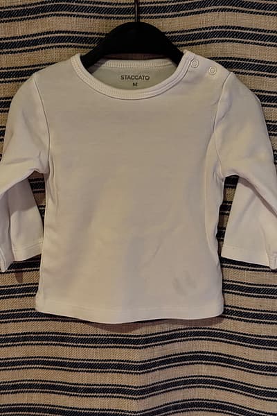 maglietta bianca da neonato by Staccato — pre-loved on Thrifted.mt