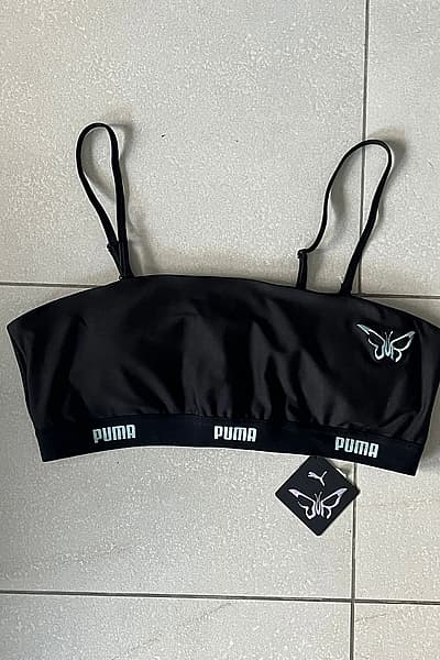 Reggiseno sportivo Puma con logo Butterfly by Puma — pre-loved on Thrifted.mt