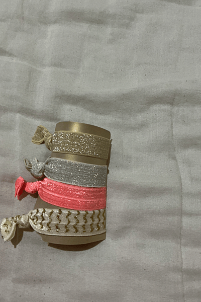 Set di elastici per capelli con paillettes — pre-loved on Thrifted.mt