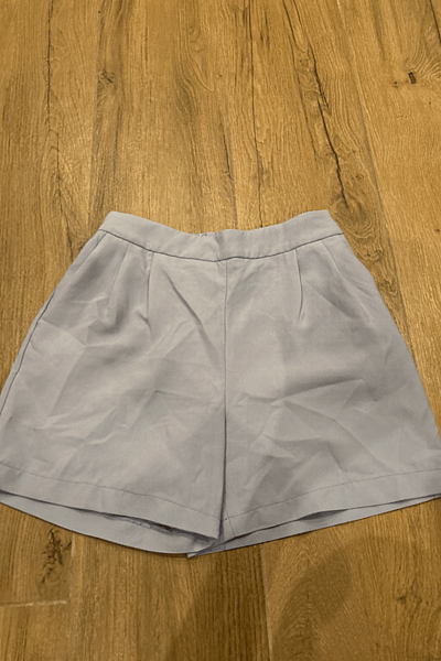 Pale blue tailored shorts by Kiabi  — pre-loved on Thrifted.mt
