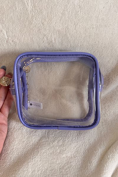 Astuccio da viaggio trasparente viola Tatcha by Tatcha — pre-loved on Thrifted.mt