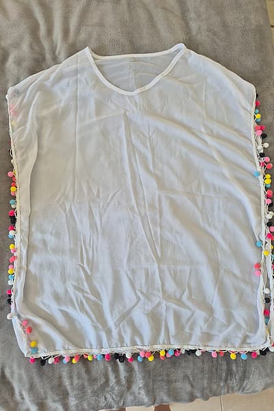 Poncho da spiaggia — pre-loved on Thrifted.mt