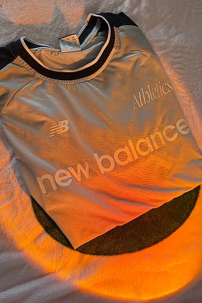 Maglietta New Balance Athletics by New Balance — pre-loved on Thrifted.mt