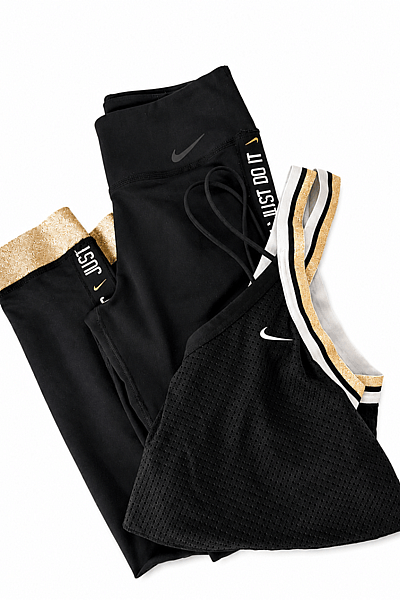 Conjunto deportivo Nike negro y dorado by Nike — pre-loved on Thrifted.mt