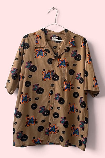 Qmis Uniqlo b'Disinn ta' Studio Ghibli by Uniqlo — pre-loved on Thrifted.mt