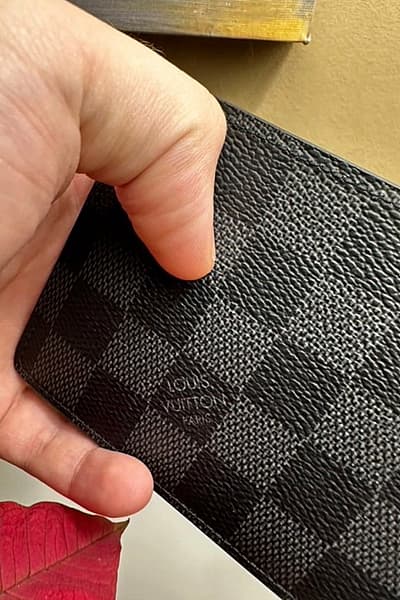 Louis Vuitton Damier Graphite Wallet by Louis Vuitton — pre-loved on Thrifted.mt