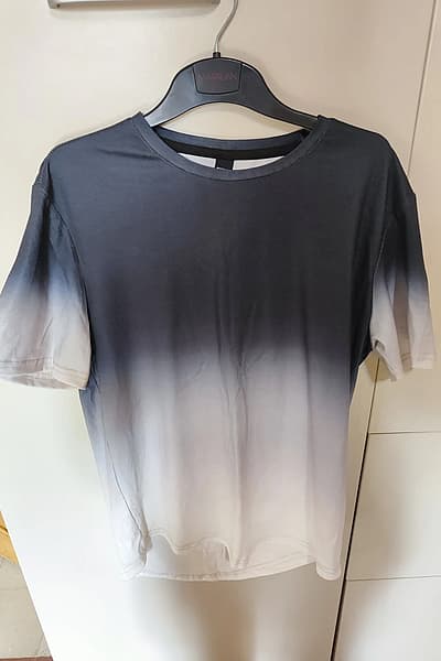 Top bianco e nero — pre-loved on Thrifted.mt