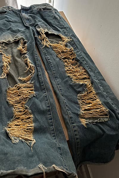 Distressed Blue Denim Jeans by PrettyLittleThing — pre-loved on Thrifted.mt