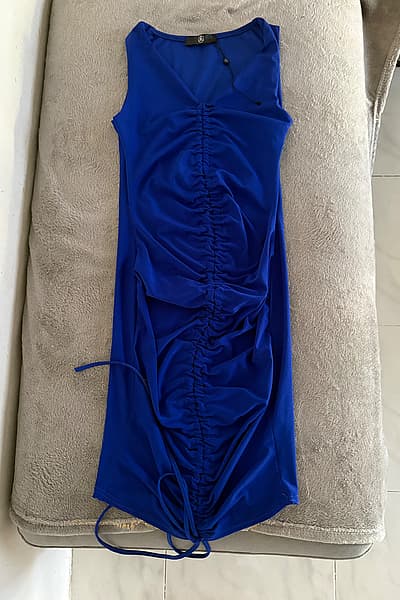 Ilbies mini blu b'riġlejn by Missguided — pre-loved on Thrifted.mt
