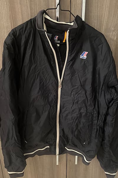 Chaqueta cortavientos de primavera by KWay — pre-loved on Thrifted.mt